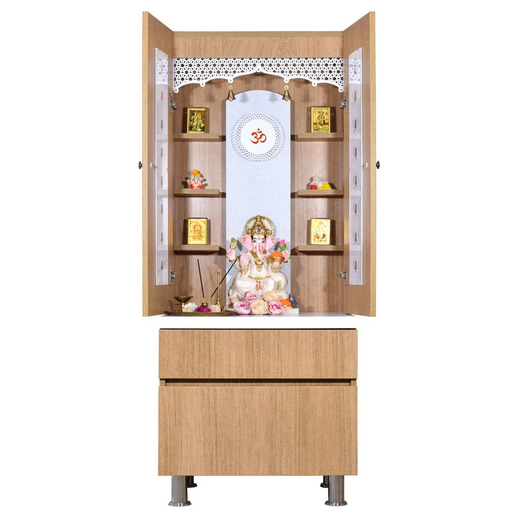 Front view of natural teak wooden pooja mandir with Om symbol display in white center panel and shelves with deity idols